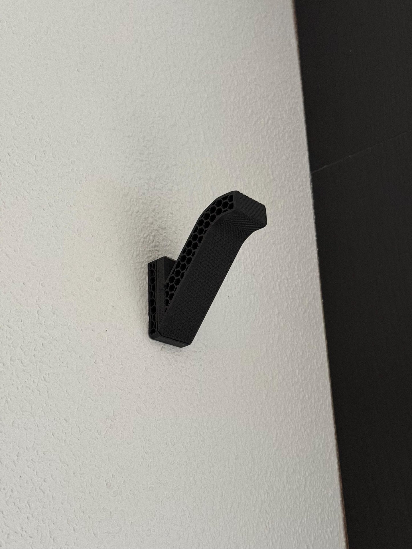Soporte casco de moto pared
